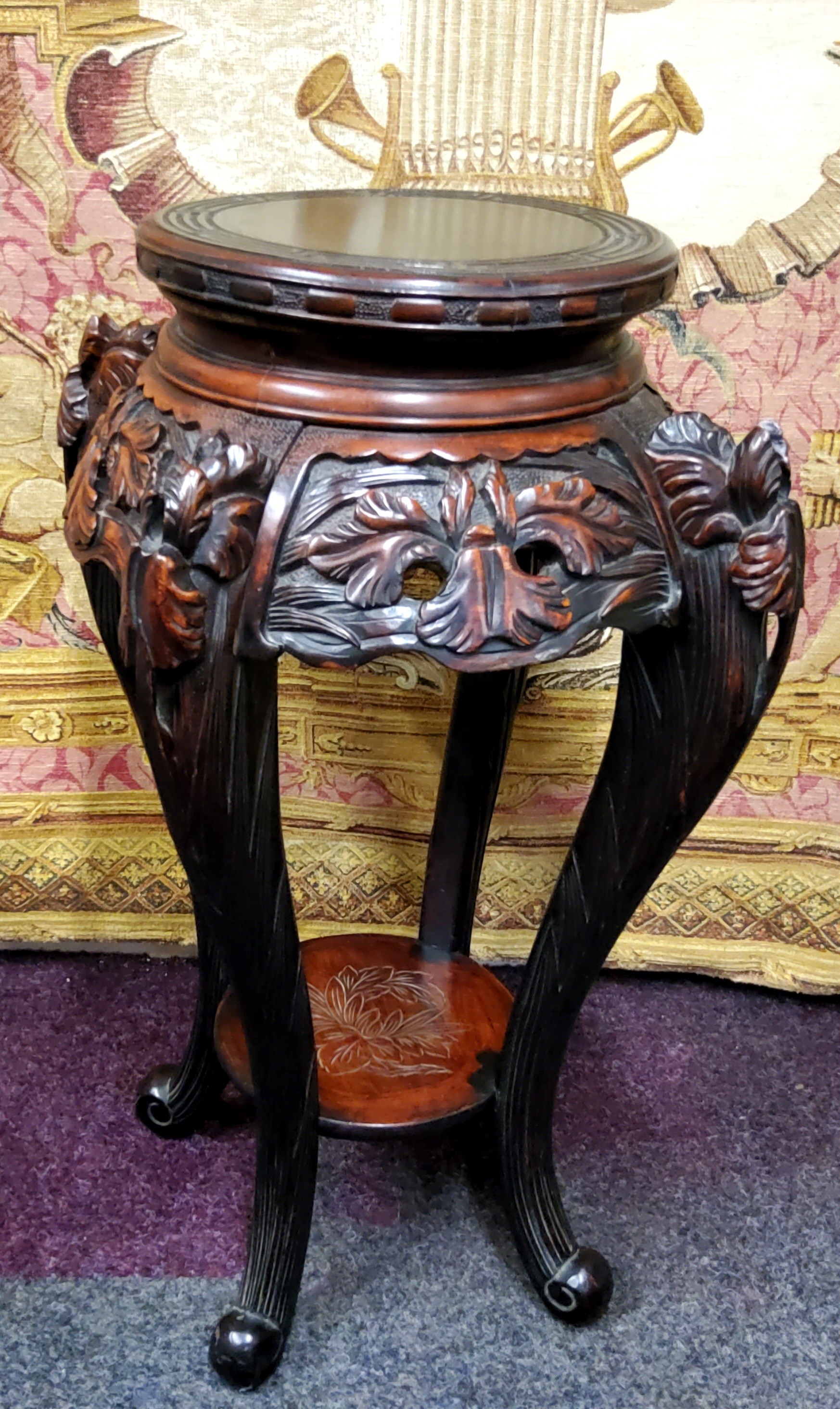 A 19th century Chinese hardwood jardiniere / temple vase stand, carved with oriental iris flower - Image 2 of 3