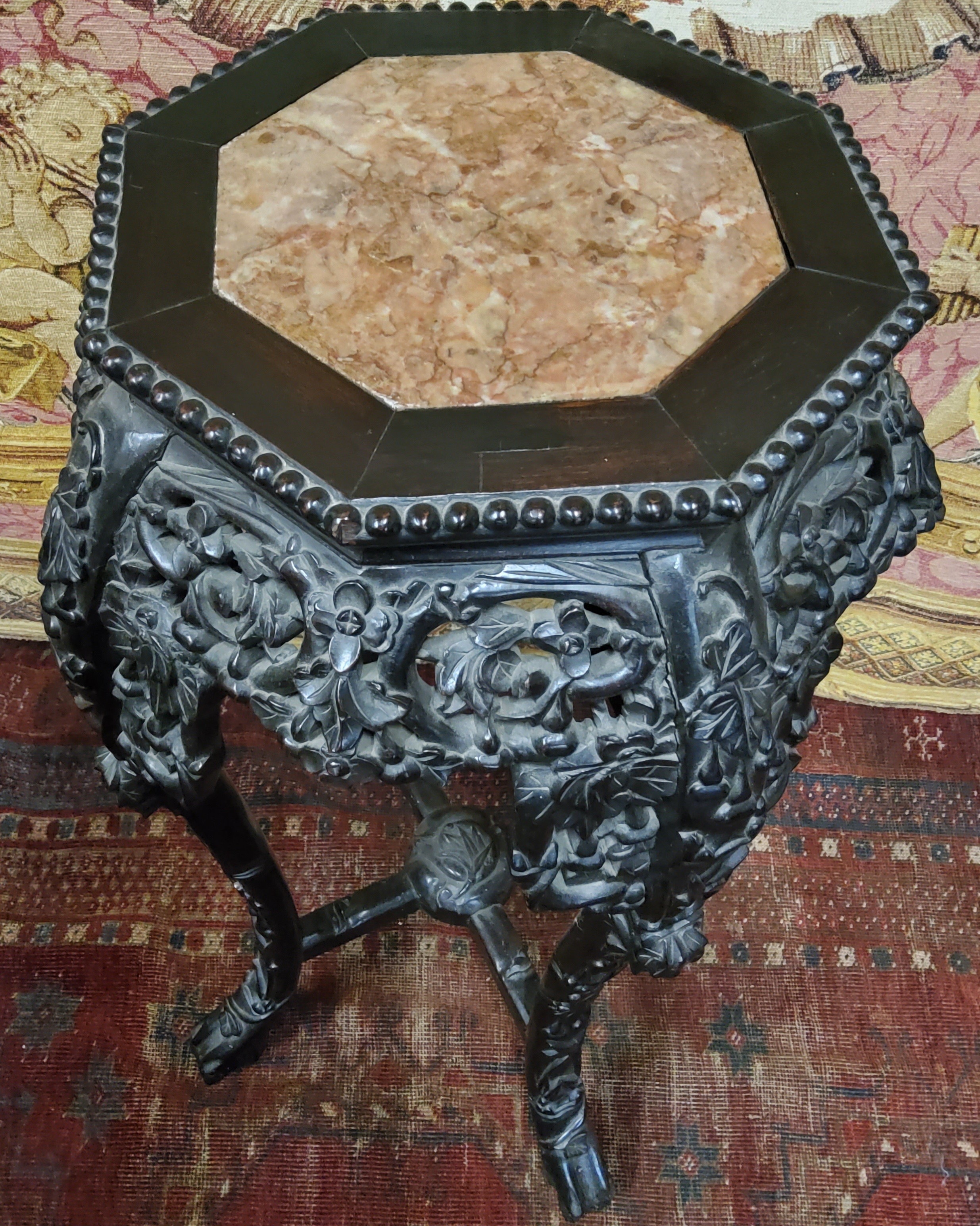 A Chinese carved hardwood jardiniere stand, octagonal marble inset panel c.1900 - Image 2 of 3