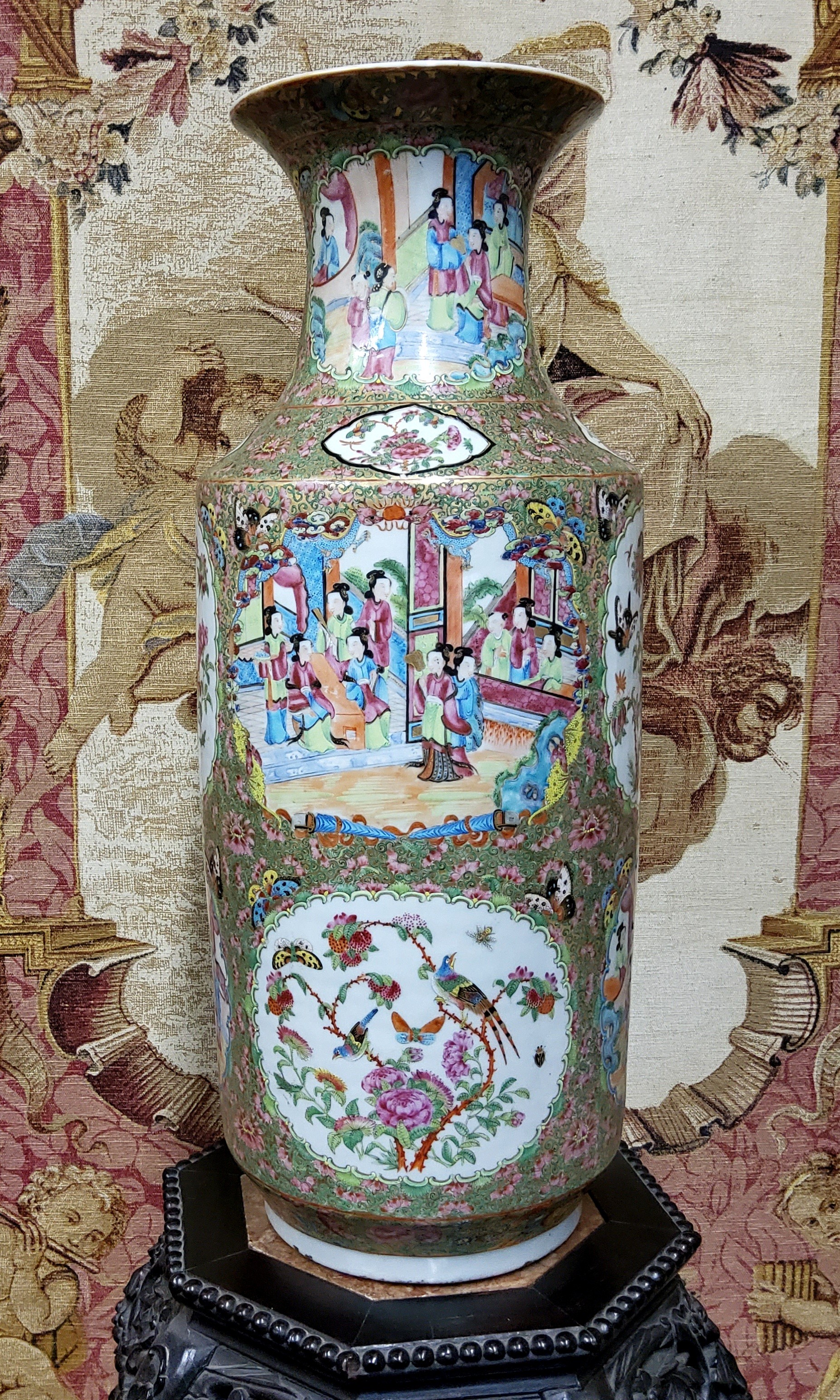 A large 19th century Cantonese Famille Rose vase, the cartouche panels decorated with figures