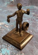 A 19th century bronze figural so-to-bed, cast as a boy, loop handle, rectangular  base, 9.5cm