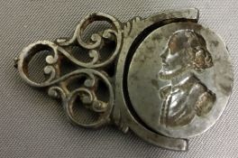 An  18th century steel swivel seal, with portrait bust and Britannia, 4cm long