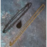 A Victorian gold plated muff chain, 154cm long; a Victorian woven hair necklace, 120cm long; a jet