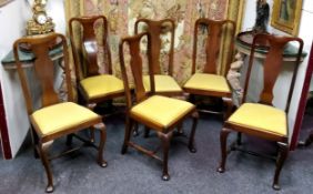 A set of six Queen Anne style mahogany dining chairs, vase shaped splat, cabriole legs, turned