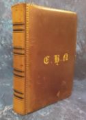 A Victorian leather photograph album, the cover with initials in gilt, tooled border, twenty leaves,