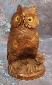 A 19th century Black Forest novelty inkwell, in the form of an owl, hinged head, glass eyes, 15cm