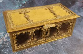 A French gilt metal and leather rectangular casket, cast in relief with flowerheads and scrolls, 7.