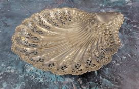 An Edwardian silver shell dish, scalloped border, pierced & embossed decoration, scroll chased