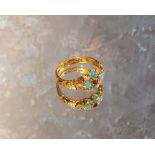 A Victorian 18ct gold diamond, turquoise, & ruby floral cluster ring, the shoulders decorated in