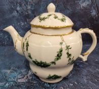 A Bristol moulded ogee shaped teapot and cover,  painted with garlands of green roses and
