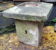 A Derbyshire gritstone garden planter plinth, the top a carved gatepost finial, the solid base,