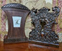 A North Italian walnut Renaissance Sgabello mask carved hall chair back, 41cm long;  another chair