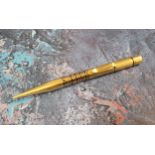 A 18ct gold calendar propelling pencil, a section of the barrel having a perpetual calendar,