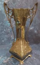 A W.M.F. Art Nouveau pewter two handled vase, embossed with sinuous lines, pierced lofty handles,