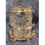 An early 20th century plated and glass biscuit barrel, domed half fluted cover, the glass cut with