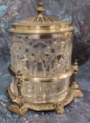 An early 20th century plated and glass biscuit barrel, domed half fluted cover, the glass cut with