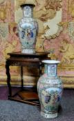 A pair of Canton Famille Rose vases, polychrome decorated with a border of chrysanthemums, roses,