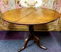 A George III oak tilt top occasional table c.1800