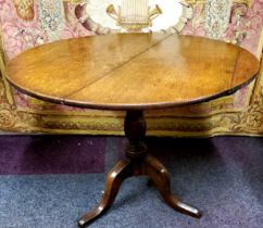 A George III oak tilt top occasional table c.1800