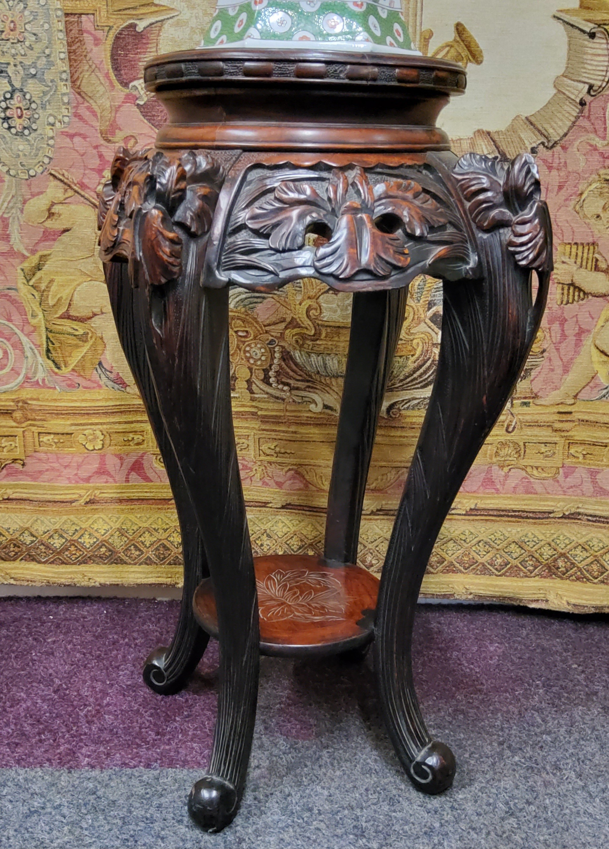 A 19th century Chinese hardwood jardiniere / temple vase stand, carved with oriental iris flower - Image 3 of 3