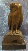 English School, 20th century, brown patinated bronzed, Owl, on a rock, rectangular base, 34cm high