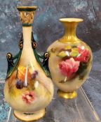 A Royal Worcester Hadley bottle vase, painted with red and pink roses, gilt flared neck, 10cm