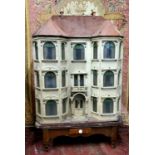A large and impressive Lines Brothers double bay fronted dolls house, c.1895,  papered red brick