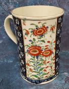A Worcester slightly waisted Japan pattern mug, decorated with alternating panels of blossoming