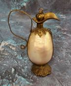 A 19th century French gilt metal and mother-of-pearl novelty scent bottle, in the form of a ewer,
