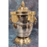 A silver plated pedestal ovoid ice bucket and cover, bud finial, lion mask loose ring handle,