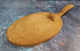 Robert Thompson Mouseman of Kilburn - a cheese board, with handle, 37cm wide