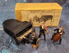 A Charben Musical Trio Set 205 comprising of a Grand Piano, Pianist, violinist, cellist & three gilt