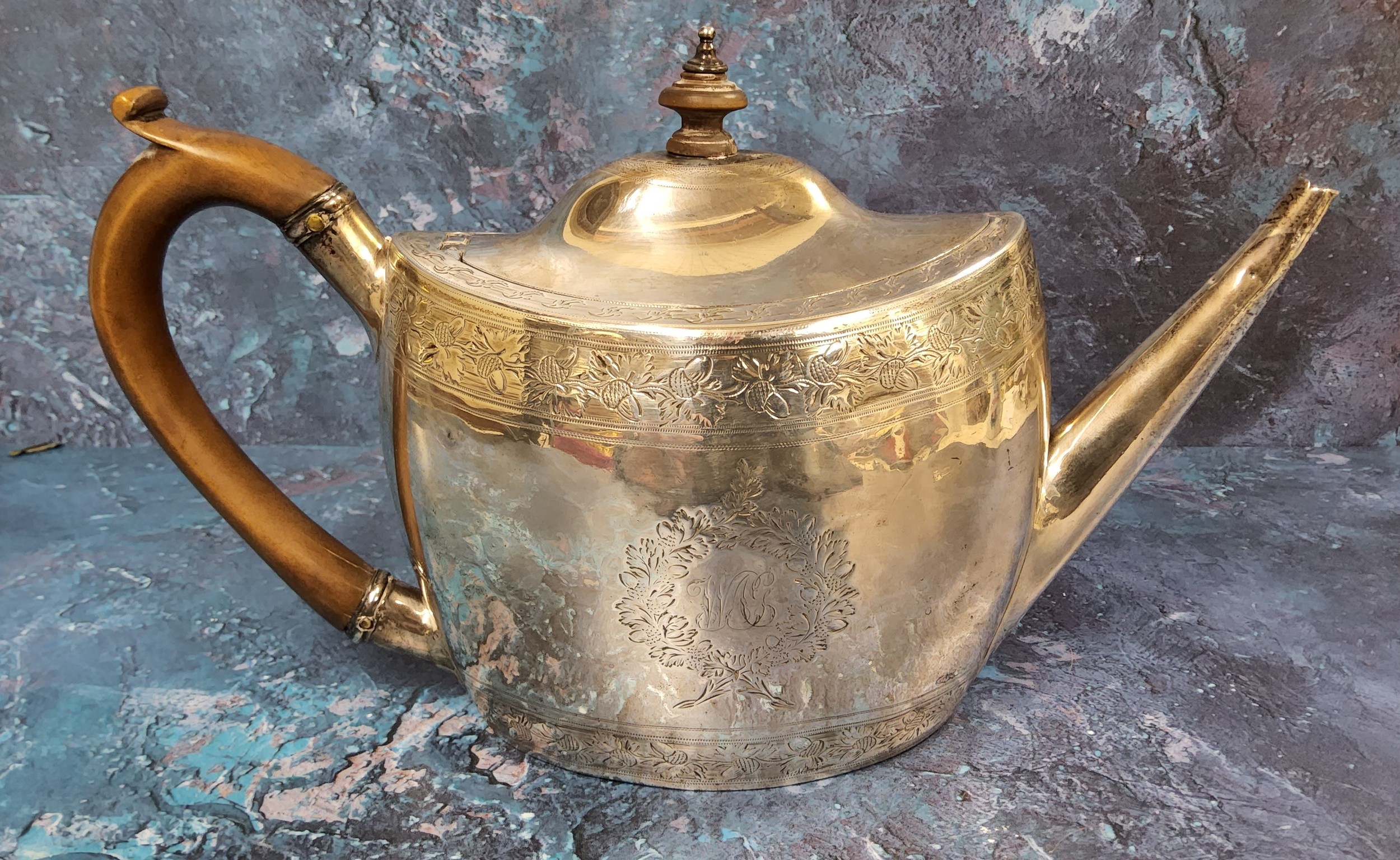 A George III silver oval teapot and cover, engraved with crest and initials, banded with fruiting - Image 3 of 5