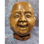 Chinese School, a brown patinated bronze, The Four Faces of Buddha, 24cm high, hardwood stand