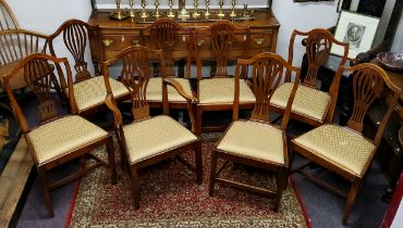 A harlequin set of eight early 19th century ash and elm farmhouse kitchen chairs, damask upholstered