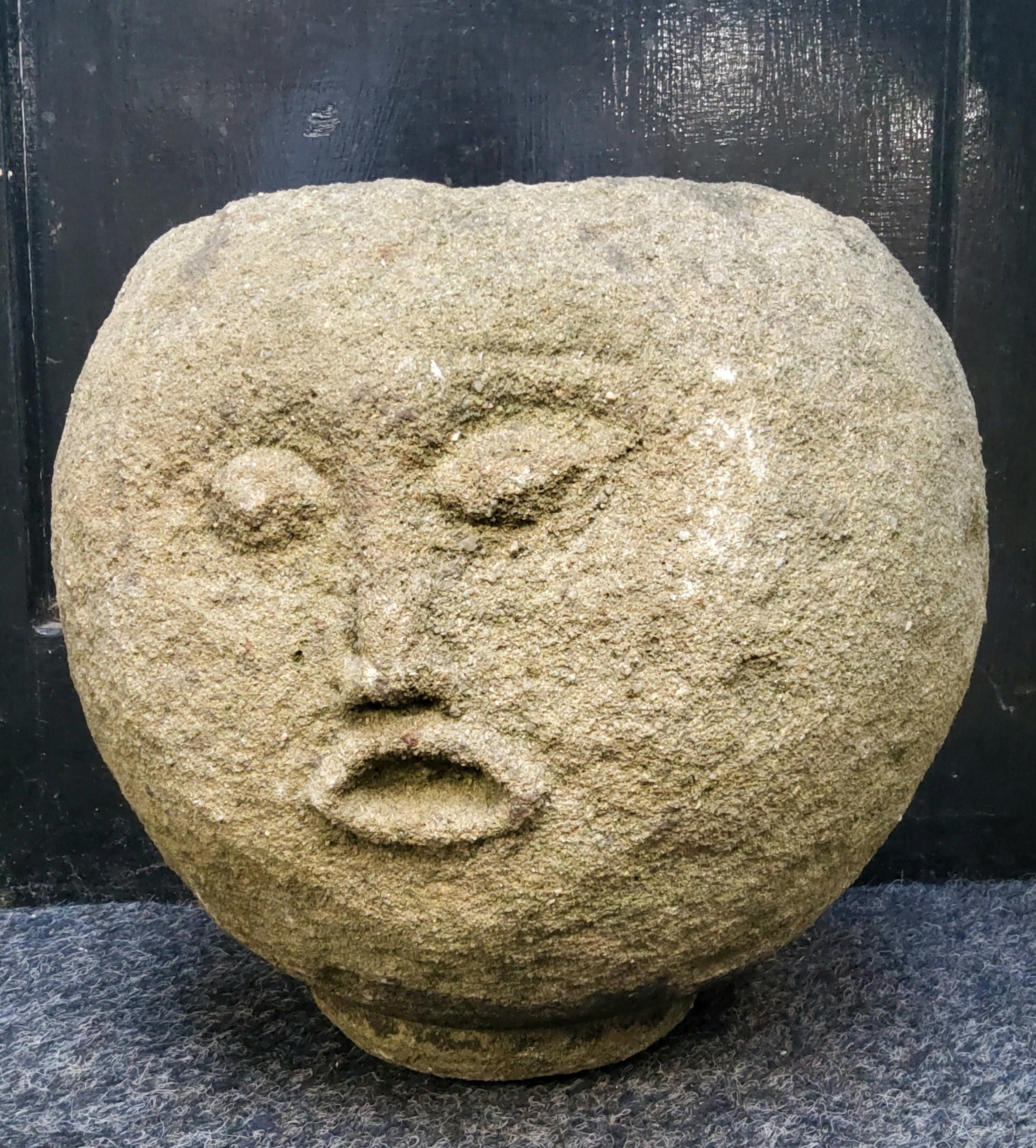 An unusual Derbyshire gritstone spherical trough, carved with a face, 33cm diameter x 30cm high - Image 5 of 5