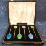 A set of six Elizabeth II silver and guilloche enamel coffee spoons,  the backs in green, blue,