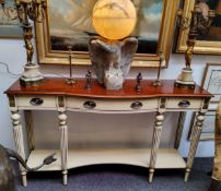 A Louis XVI style sideboard, mahogany surface above three drawers to frieze, intermitted gilt