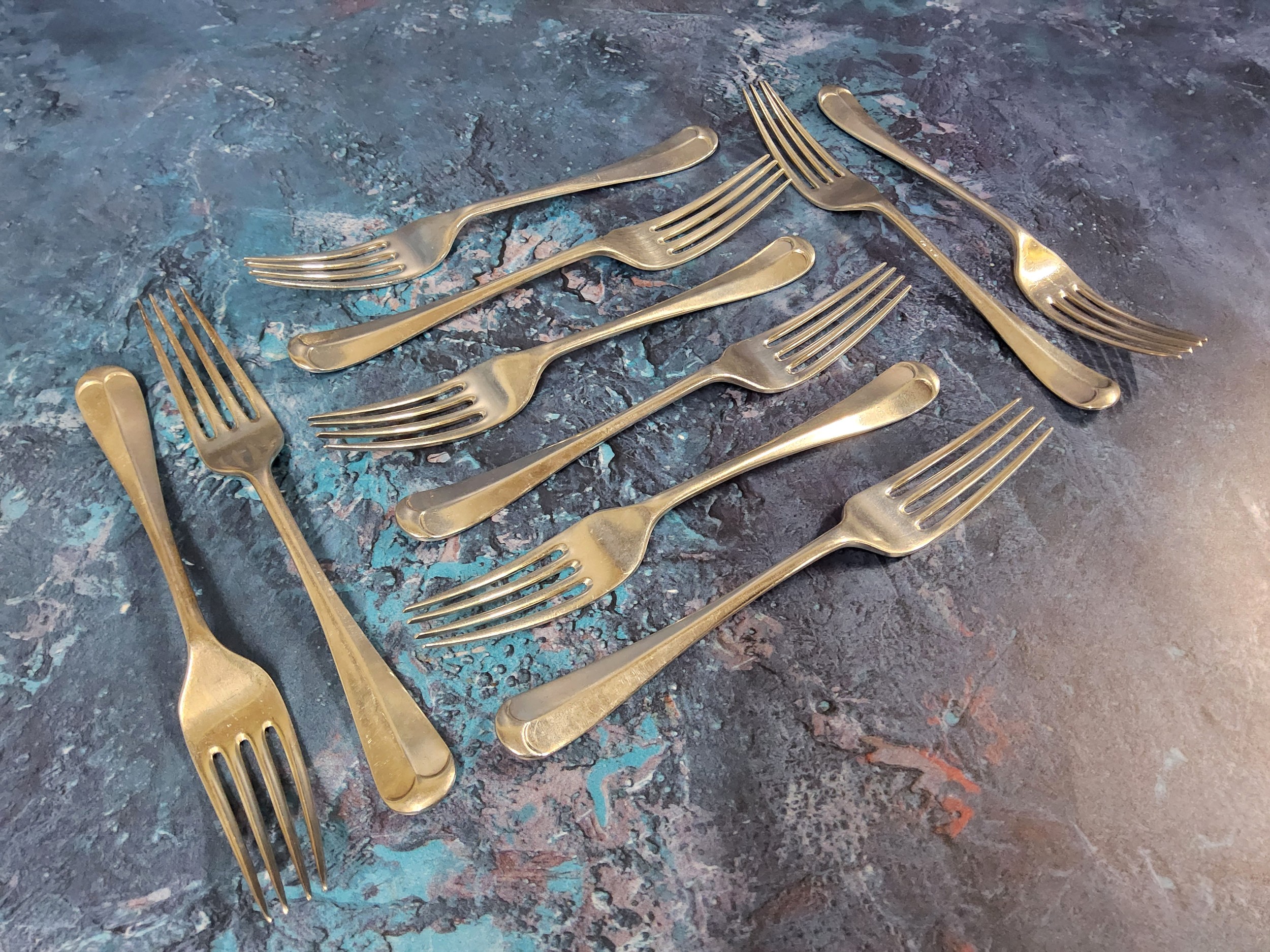 A set of ten silver Hanoverian pattern dessert forks, Atkin Brothers, Sheffield 1929, 359g, 14.2toz