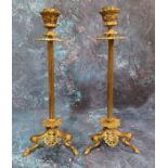 A pair of 19th century Barbedienne gilt bronze candlesticks, reeded columns, triform scroll legs,