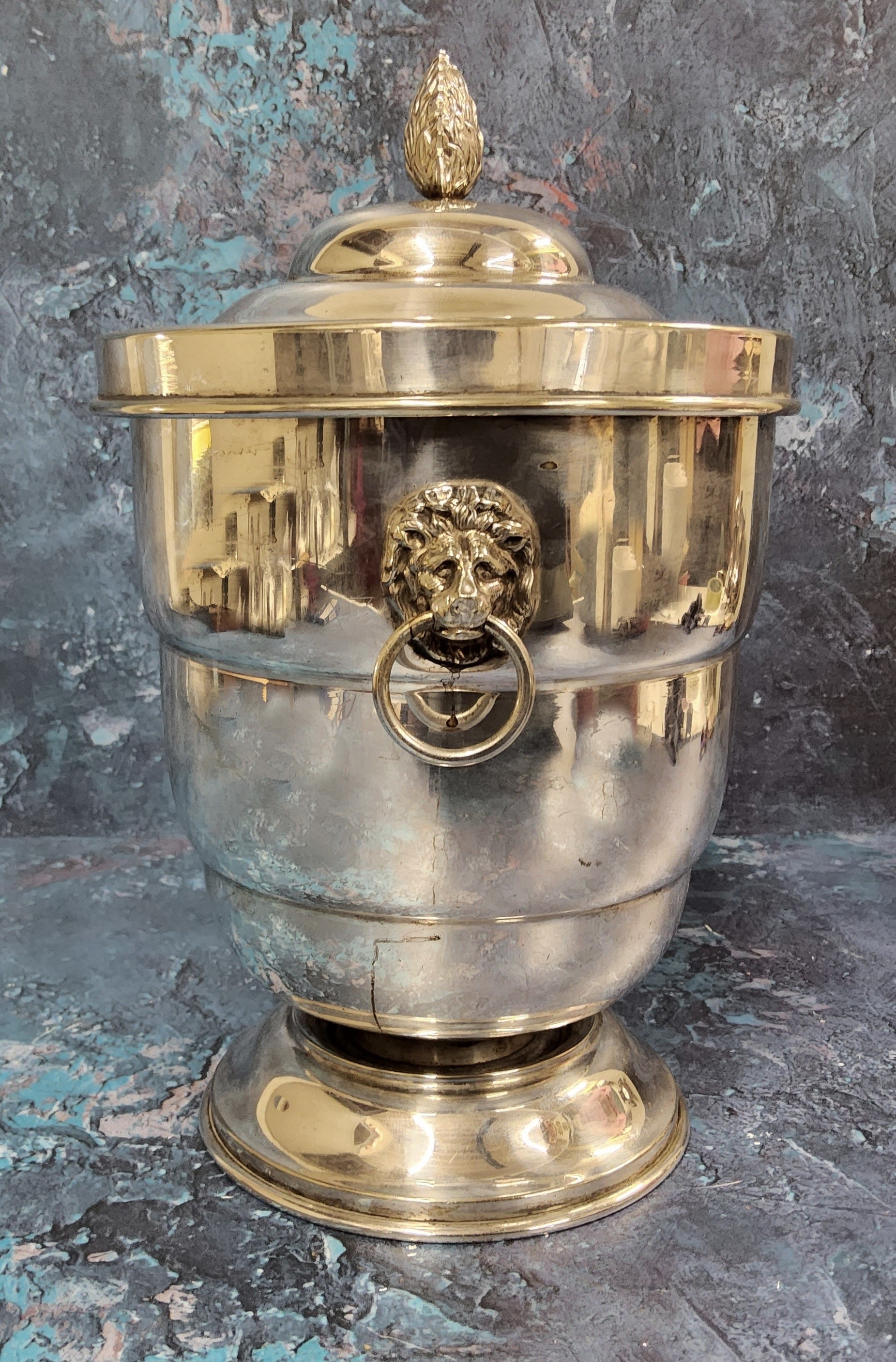 A silver plated pedestal ovoid ice bucket and cover, bud finial, lion mask loose ring handle, - Image 2 of 2