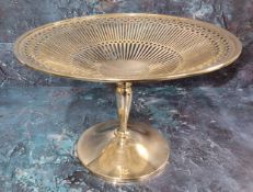 An Edwardian silver table centre tazza, pierced geometrical, baluster shaped stem, 16.5cms high,