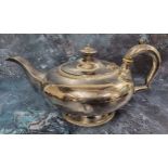 A George IV silver teapot, of compressed circular form, gadrooned border, acanthus scroll handle,