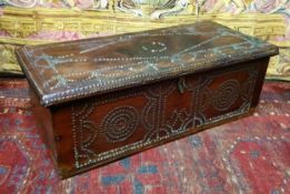 A Turkish Ottoman chest, profusely studded decoration throughout, the iron hinged cover revealing