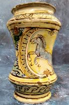 A South European maiolica albarello drug jar, of waisted form, decorated in yellow and blue and