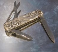 An early 20th century Norwegian silver pocket knife, the case boldly embossed with scrolling