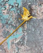 A yellow gold Hummingbird stick pin 7.28g (faults)
