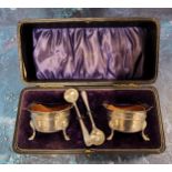 A pair of Edwardian silver cauldron salts, quarter girdle, wavy rim, shell and pad feet, 5.5cm diam,