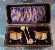 A pair of Edwardian silver cauldron salts, quarter girdle, wavy rim, shell and pad feet, 5.5cm diam,
