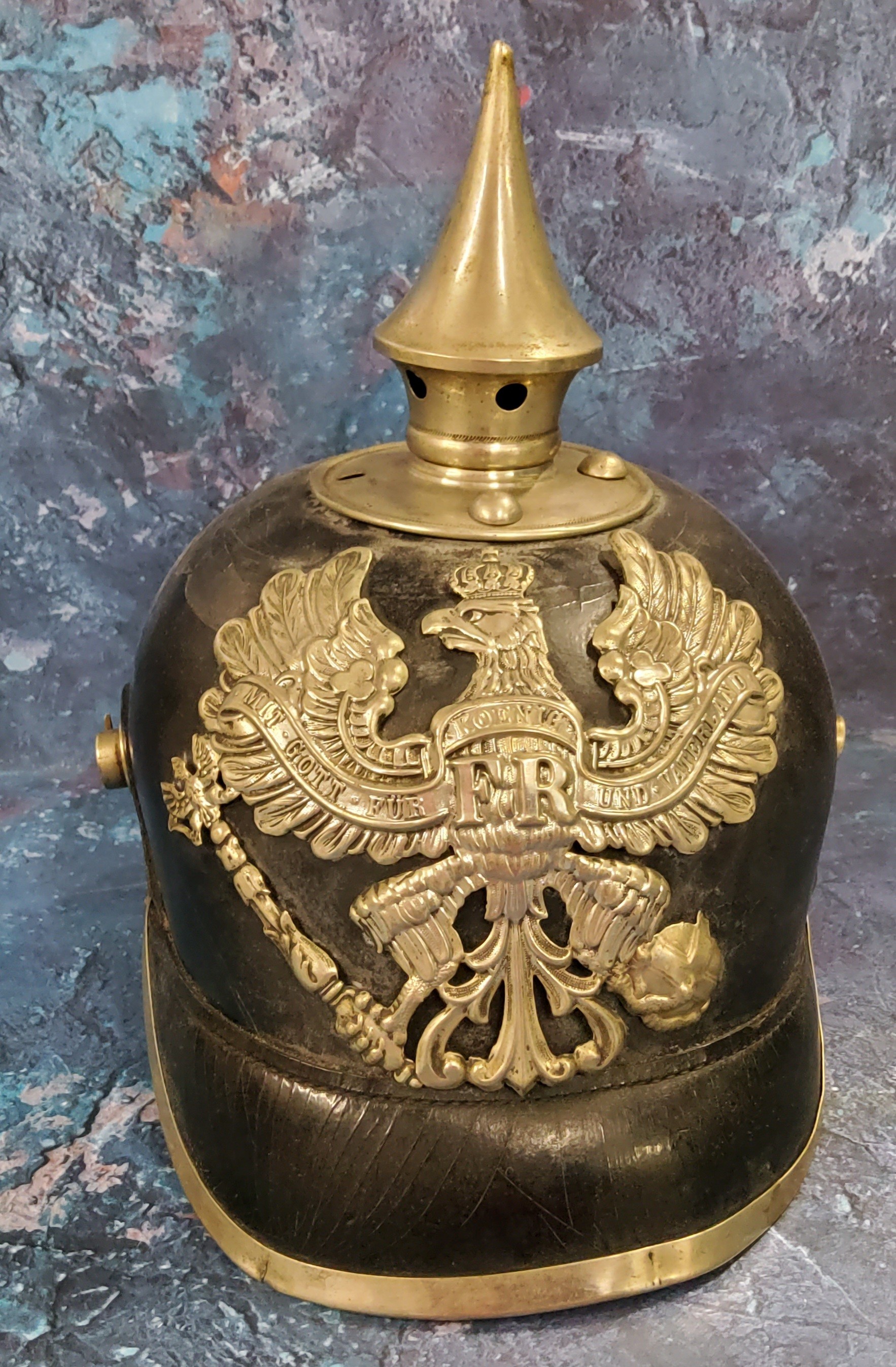 A World War I German Pickelhaube spiked helmet leather skull, original lining spike top, pressed