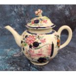 A very rare Worcester globular teapot and cover,  painted in puce with a landscape within a scroll